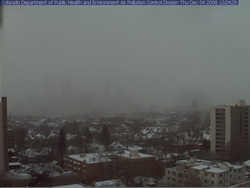Where's Denver?  This webcam view from the Colorado Department of Public Health and Environment shows Denver obscured in the snowfall at 1:00pm Thursday.