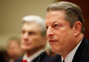 Former Vice President Al Gore, right, and former Virginia Sen. John Warner testify on Capitol Hill in Washington, Friday, April 24, 2009, before the House Energy and Environment subcommittee.  (AP Photo/Manuel Balce Ceneta)