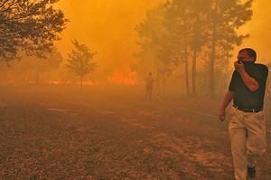 Atmospheric scientists claim the potential for a 50% increase in wildfire activity due to global warming. (AP Photo)
