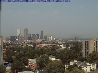 The view of the Rocky Mountains from Denver is obscured by haze caused by smoke from wildfires burning across the western United States. 