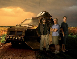 Sean Casey, Josh Wurman, Reed Timmer next to Storm Chasers vehicle, TIV2. (Discovery Channel)