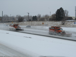 CDOT snowplows on I-25
